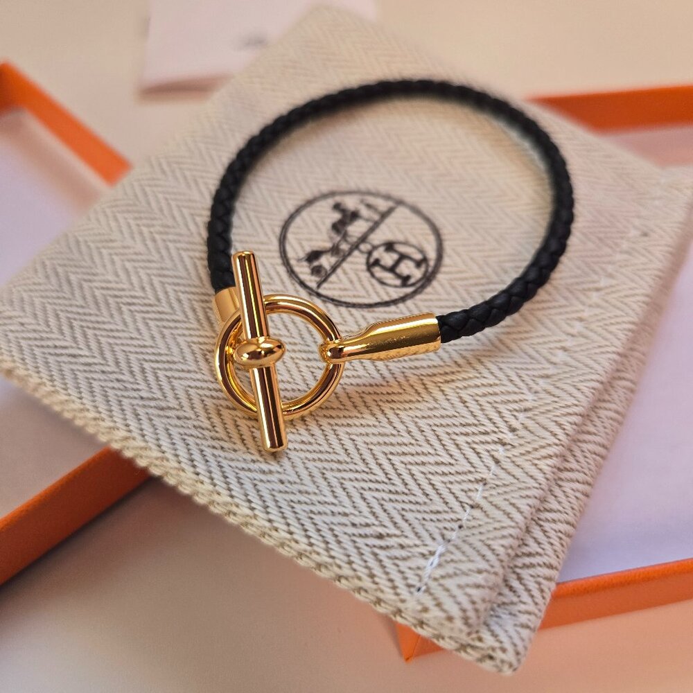 Hermes braided yellow gold plated calf leather bracelet